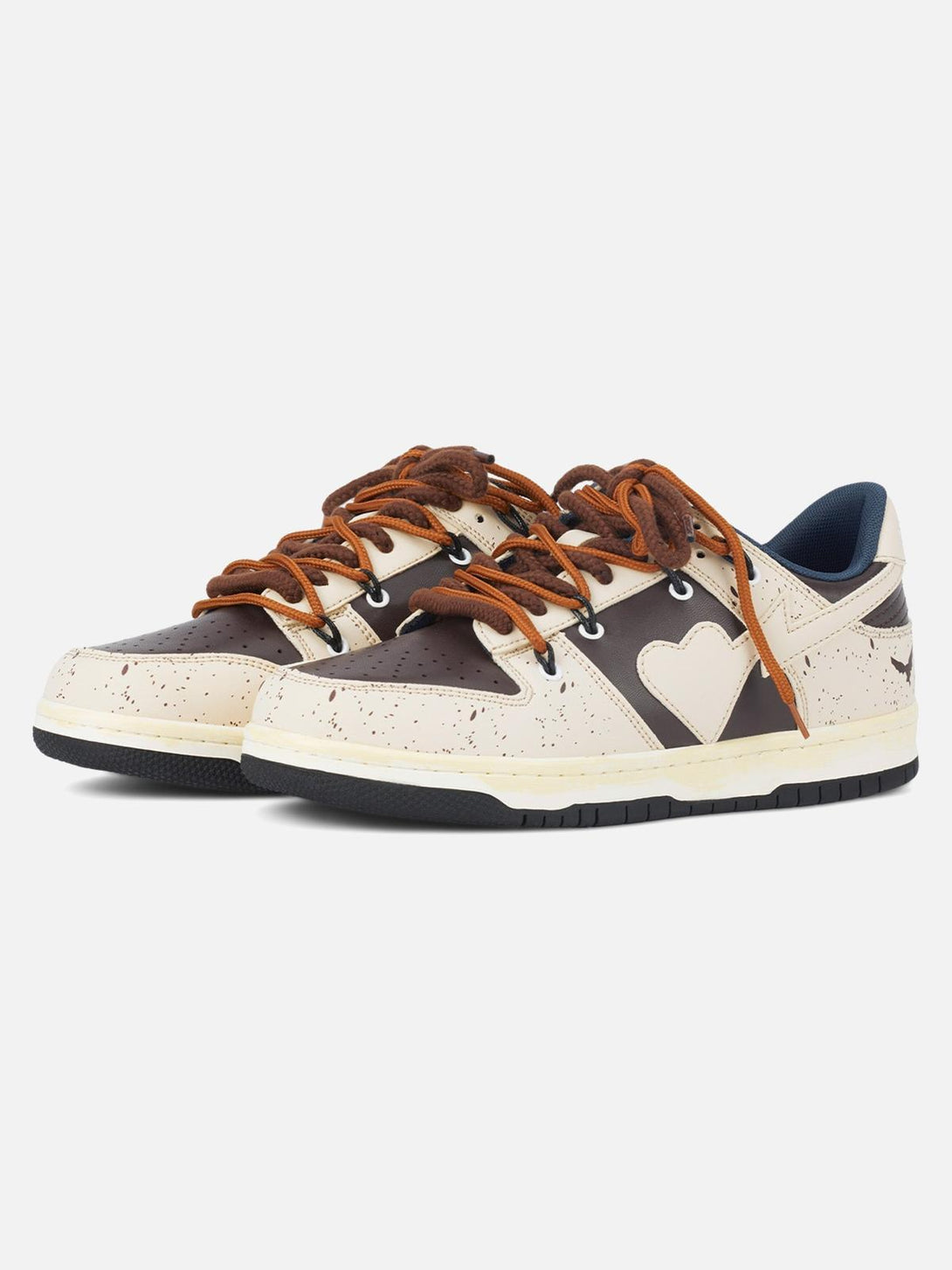Front view of TALISHKO brown sneakers with heart design and contrasting laces.