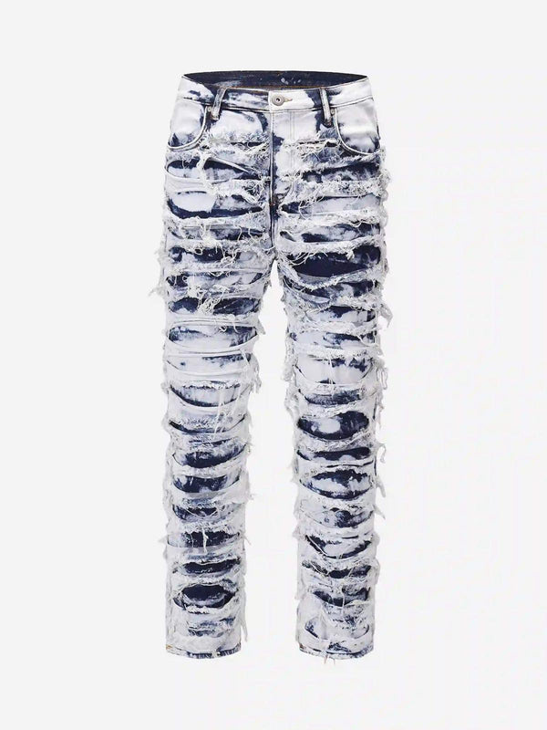 Front view of distressed blue slim fit jeans by TALISHKO, showcasing a bold, urban style.