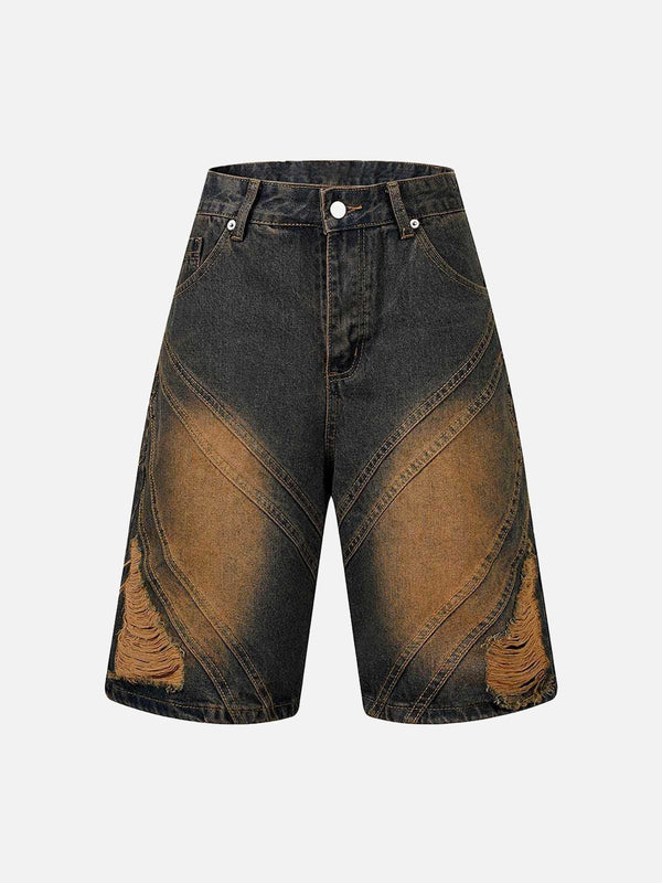 Front view of TALISHKO high street ripped denim shorts in light blue with unique distressing.