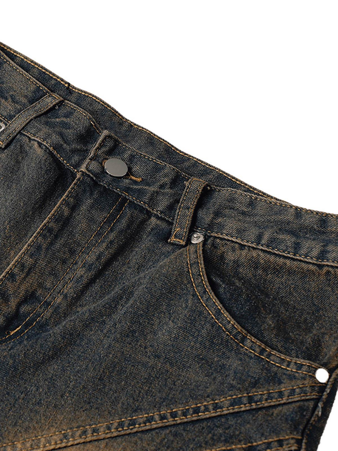 A detailed view of TALISHKO denim shorts in light blue, showcasing unique stitching and design.