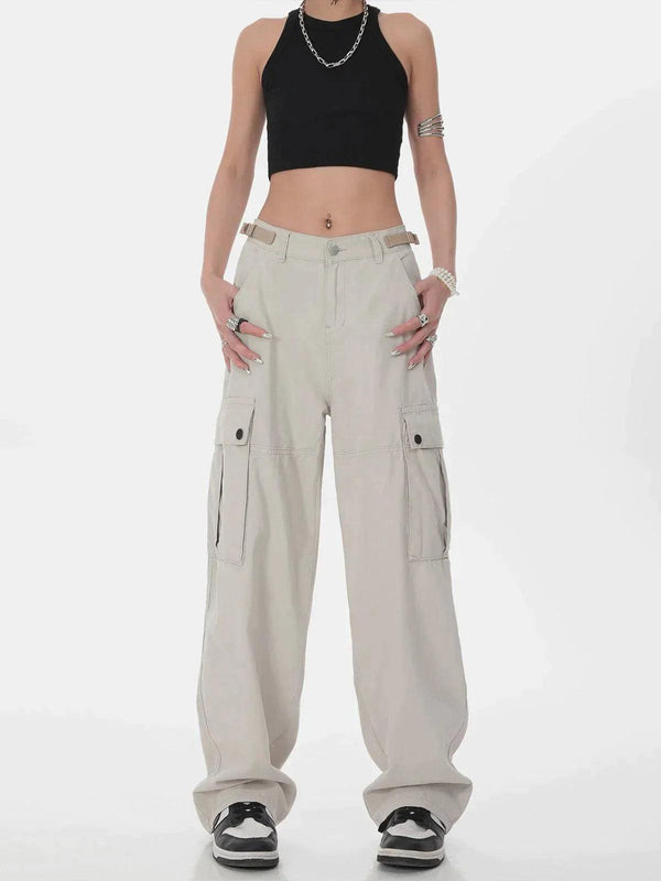 Front view of apricot hip hop straight cargo pants by TALISHKO, styled with a black crop top.