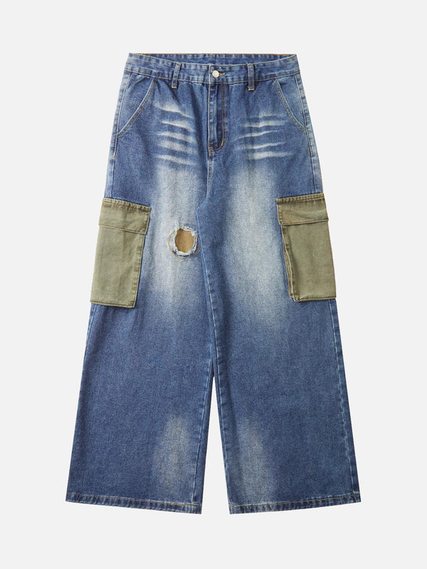 Front view of blue cargo jeans with large pockets and a distressed look, designed by TALISHKO.