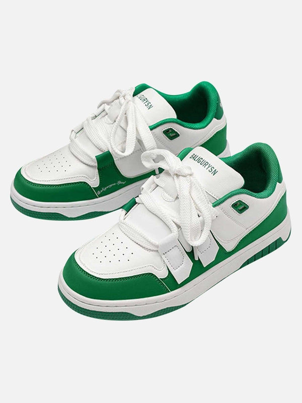 TALISHKO green and white sports casual shoes, front view showcasing sleek streetwear style.