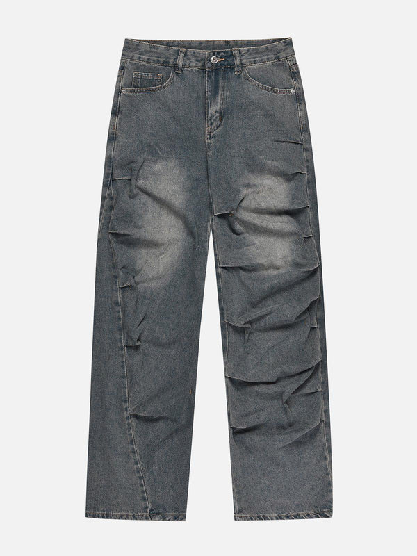 Front view of blue irregular wrinkle jeans by TALISHKO, showcasing a relaxed street style.