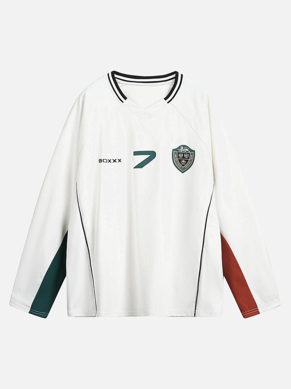 White long sleeve jersey with contrast stitching by TALISHKO, featuring a front view design.