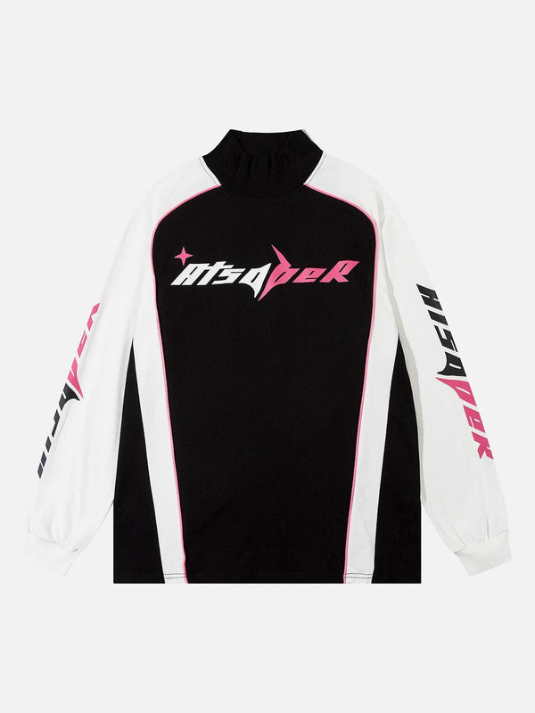 Front view of a black and white TALISHKO jersey long sleeve with bold pink and white graphics.