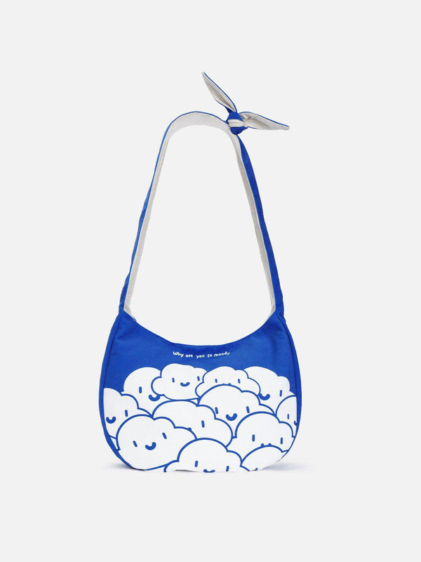 TALISHKO canvas bag in blue, front view, featuring playful cloud cartoon design and knotted strap.