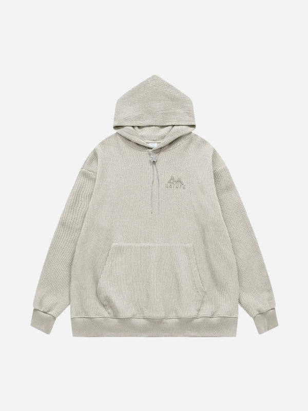 Front view of a beige knit solid hoodie by TALISHKO, perfect for urban style enthusiasts.