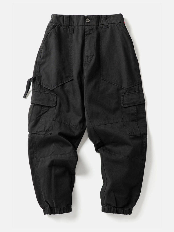 Black cargo pants with multiple pockets, front view, by TALISHKO, ideal for urban style.