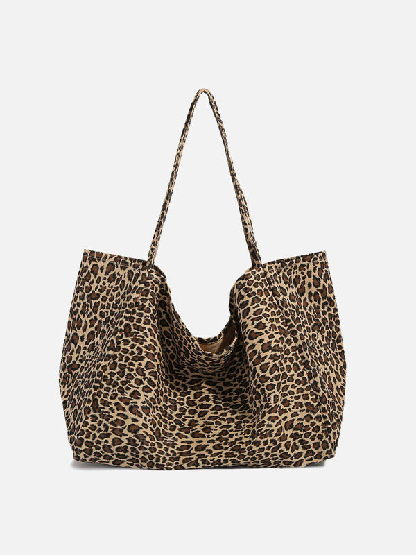 Front view of a brown leopard print tote bag by TALISHKO, perfect for urban style enthusiasts.