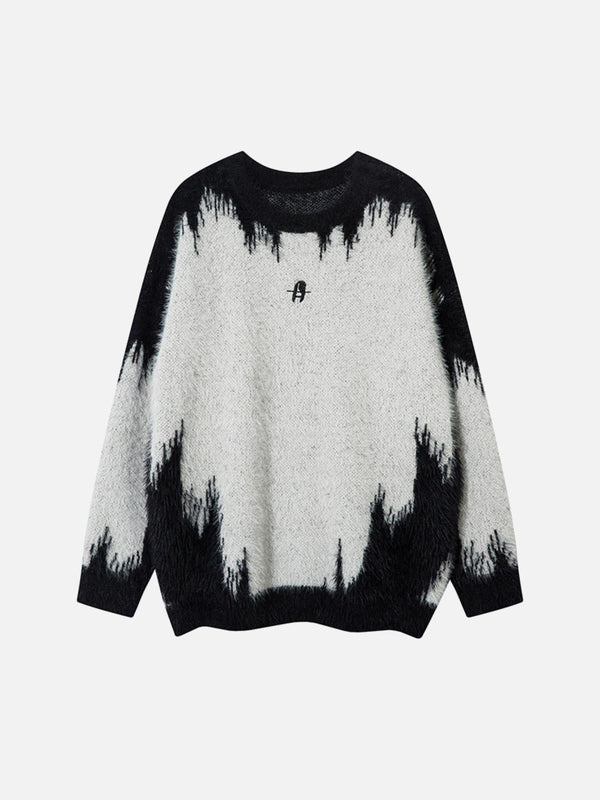 Front view of a black and gray jacquard sweater by TALISHKO, showcasing a bold street style.