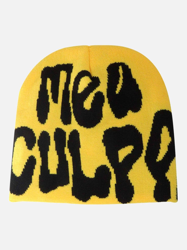 Bold yellow knit hat featuring "Mea Culpa" in black, designed by TALISHKO for urban style.