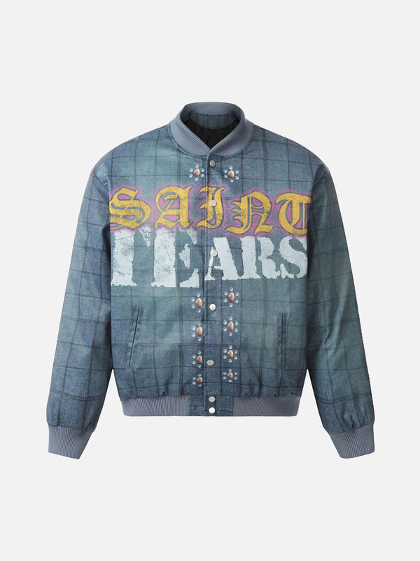 Front view of blue quilted bomber jacket with bold lettering, designed by TALISHKO.