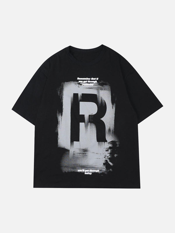 Front view of a black graffiti print tee by TALISHKO, featuring bold lettering design.