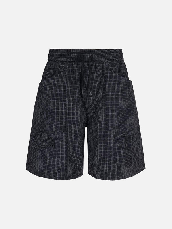 Front view of green TALISHKO light quick-dry cargo shorts, featuring a stylish checkered pattern.