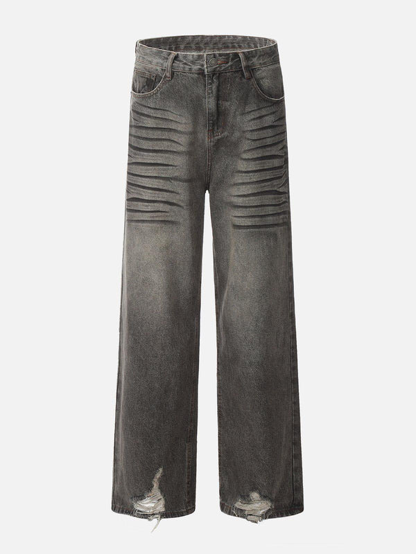 Front view of gray washed loose jeans by TALISHKO, featuring line print and distressed details.
