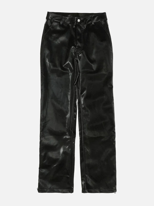 Front view of black loose-fit pants by TALISHKO, showcasing sleek street style.