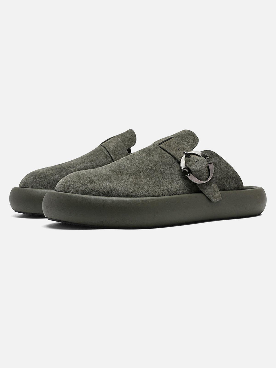 Front view of green suede closed-toe half-slip shoes with buckle detail by TALISHKO.