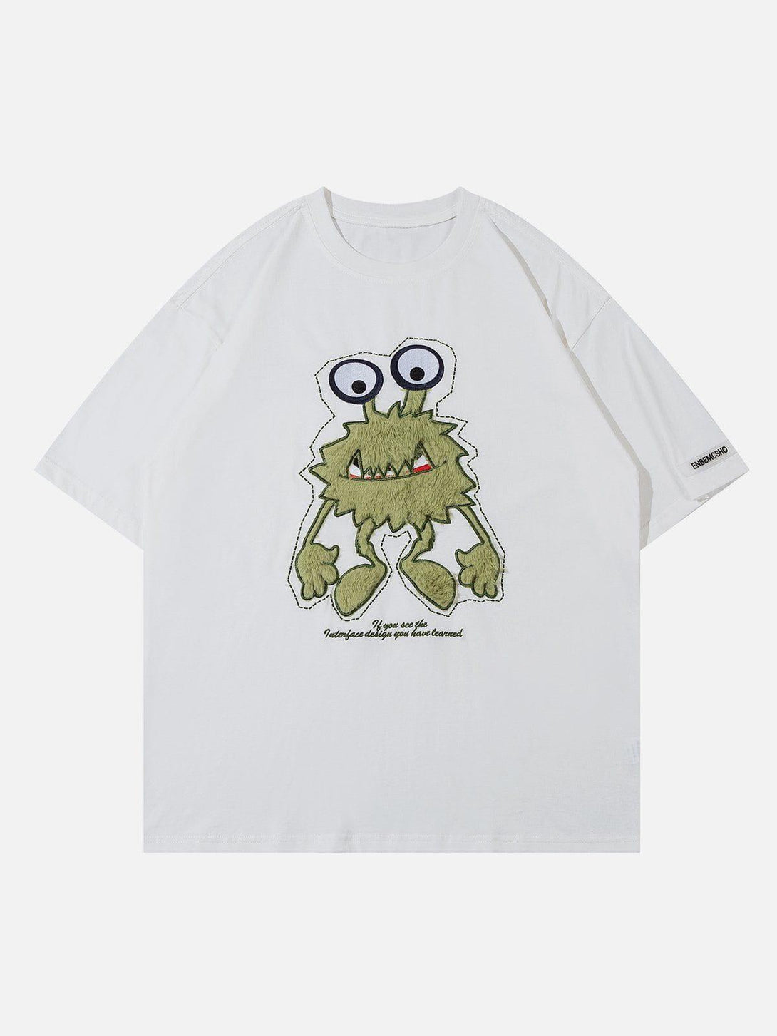 Front view of white tee with quirky monster embroidery by TALISHKO, perfect for casual wear.