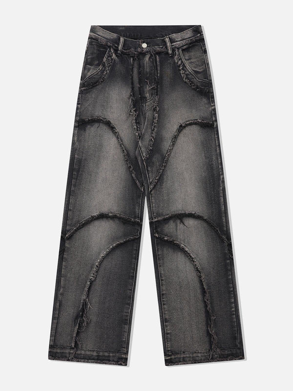 Front view of black washed jeans with multi-fringe detailing by TALISHKO, ideal for urban style.