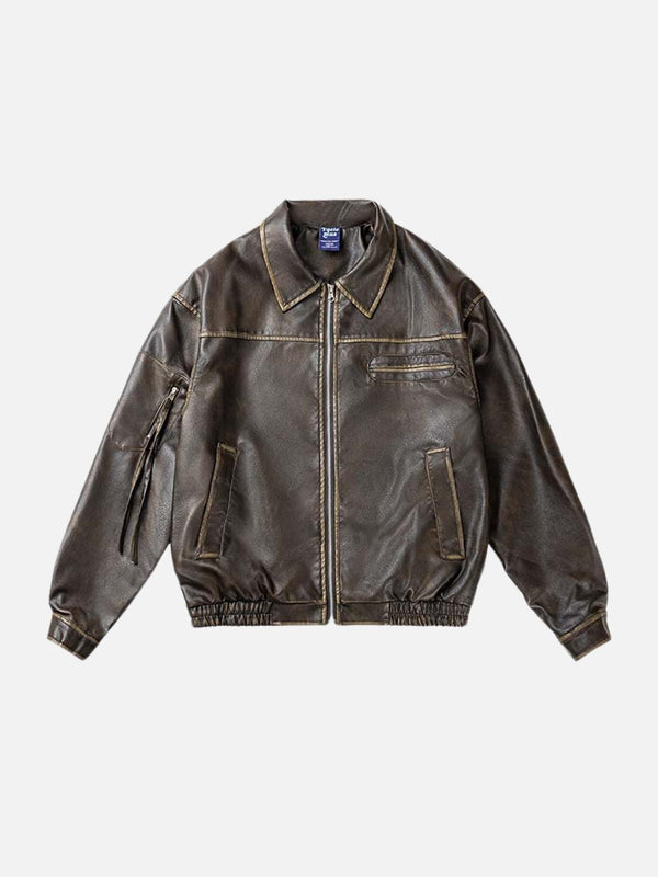 Front view of a coffee-colored faux leather cropped jacket by TALISHKO, featuring multiple pockets.
