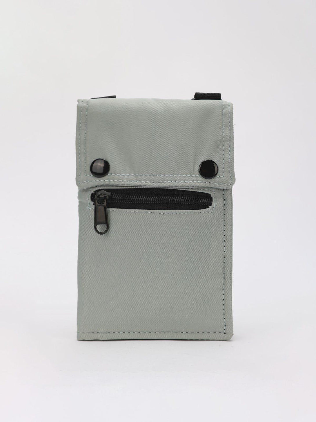 Front view of a gray TALISHKO crossbody bag with sleek zipper pocket and button details.