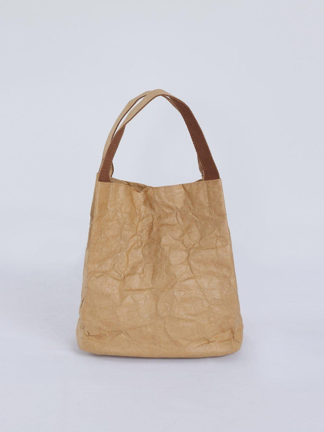 Front view of TALISHKO's khaki wrinkle kraft paper bag with brown straps, ideal for urban style.