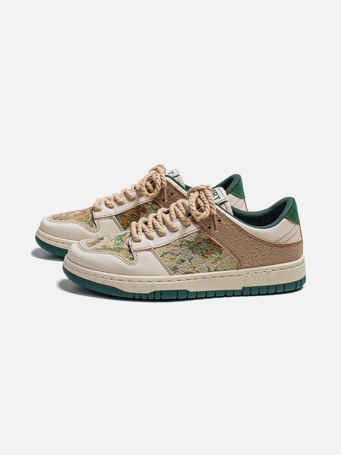 Front view of TALISHKO skate shoes in apricot, showcasing a vibrant oil painting forest design.