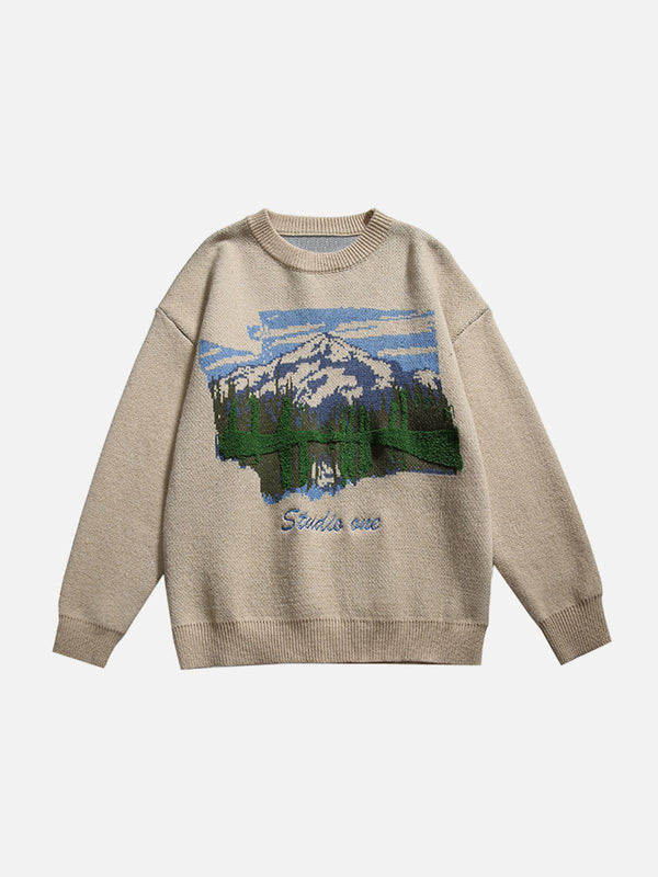 Front view of TALISHKO apricot sweater with mountain landscape design, perfect for casual style.