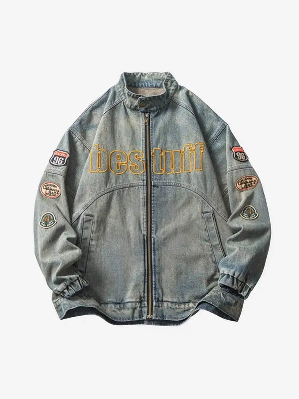 Front view of blue denim jacket with embroidered patches, showcasing a hip-hop style by TALISHKO.