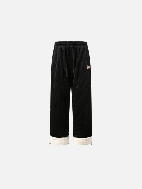 Front view of black paneled padded sweatpants by TALISHKO, featuring cozy, cuffed hems.