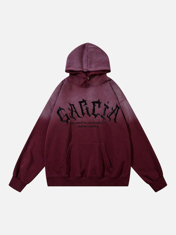 Front view of TALISHKO's dark purple hoodie with bold embroidered lettering, ideal for trendy outfits.