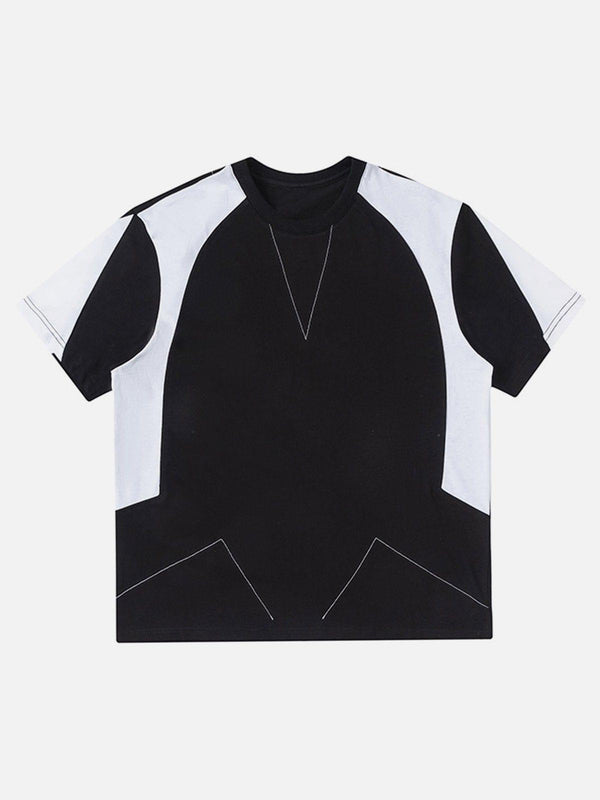Front view of a black and white patchwork tee by TALISHKO, featuring bold color blocking.
