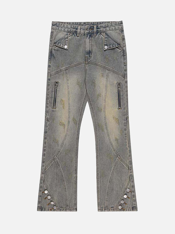 TALISHKO patchwork jeans in blue, front view, showcasing distressed details and zipper accents.