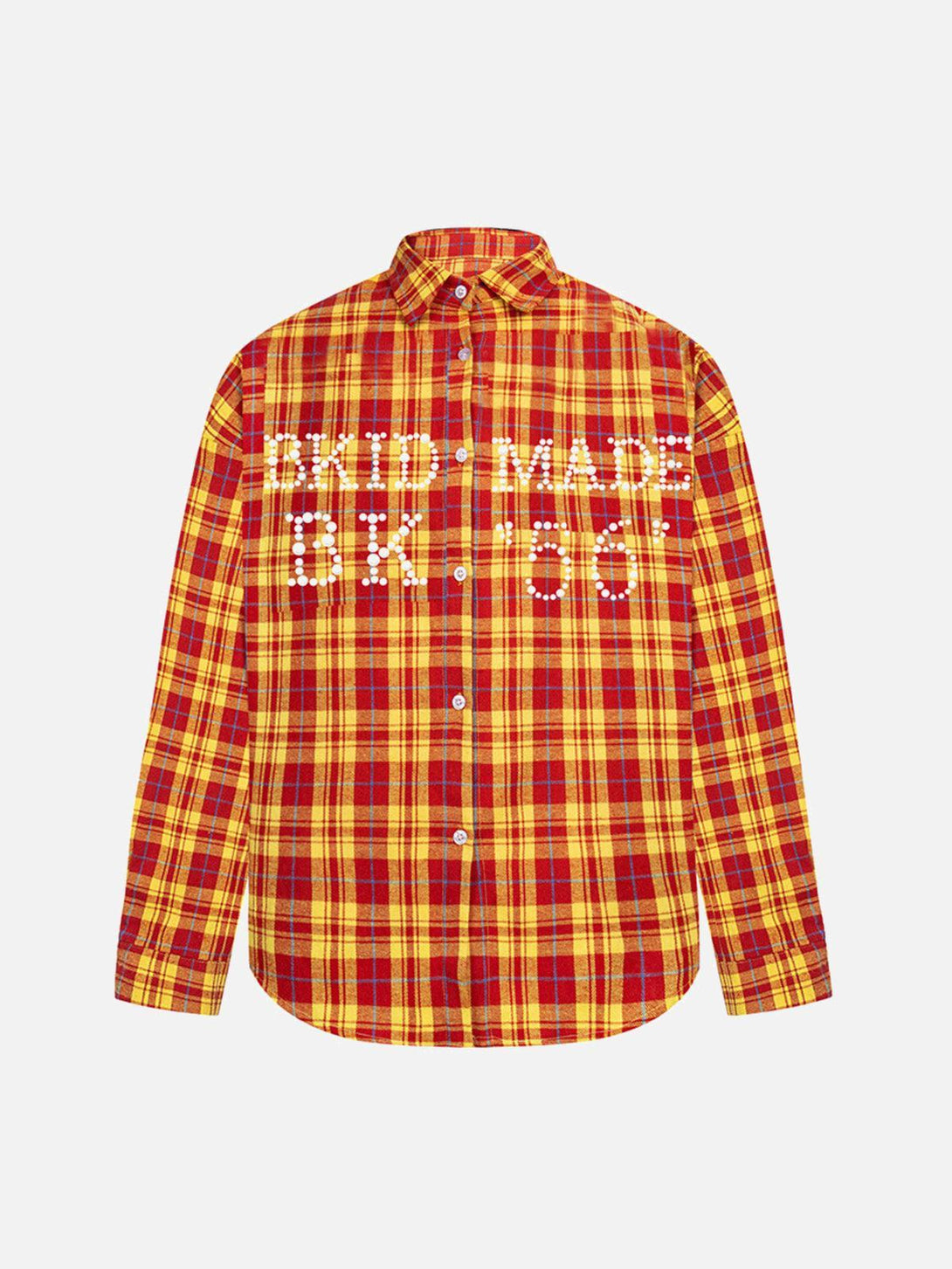 Front view of TALISHKO's orange plaid long sleeve shirt with unique white lettering design.