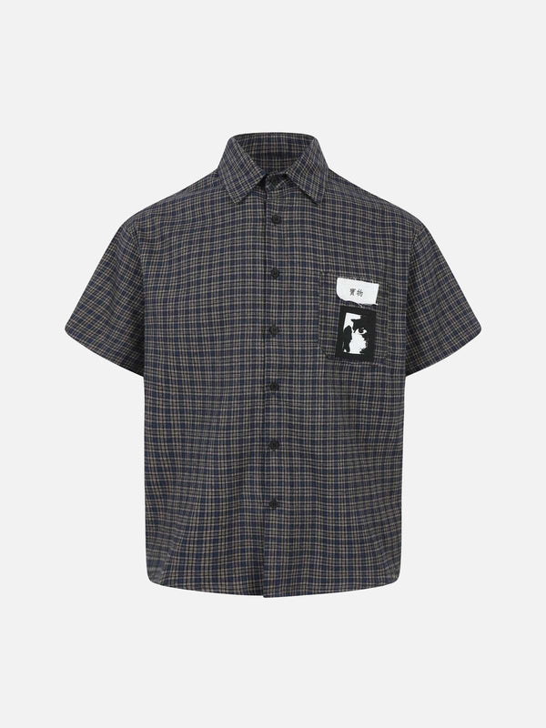 Front view of navy plaid short sleeve polo shirt with unique patch detail by TALISHKO.
