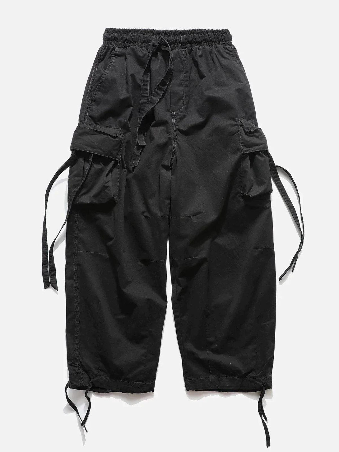 Front view of black flap pocket pants by TALISHKO, offering a relaxed, urban style.