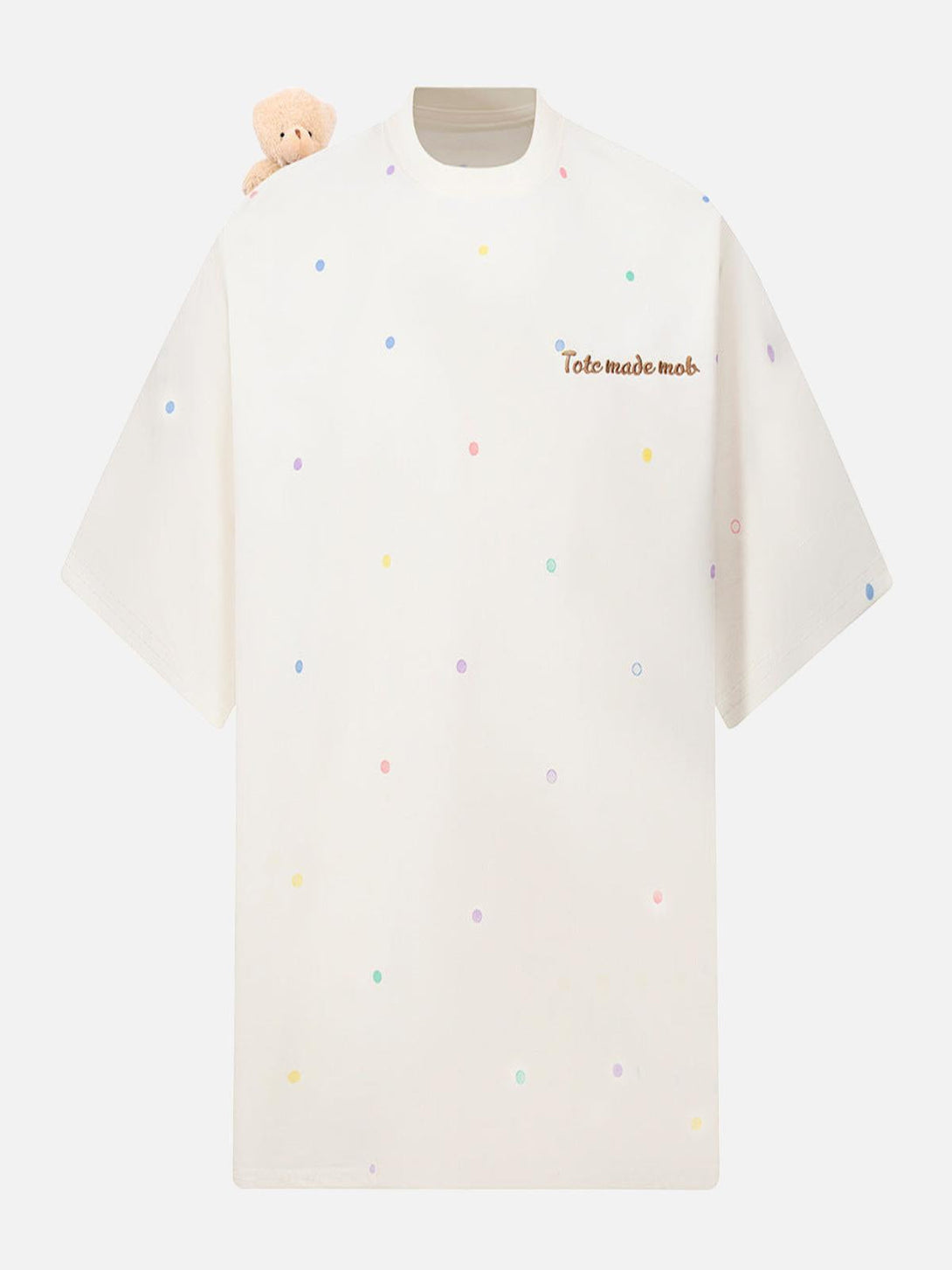 Front view of TALISHKO's apricot t-shirt with colorful polka dots and a cute bear detail.