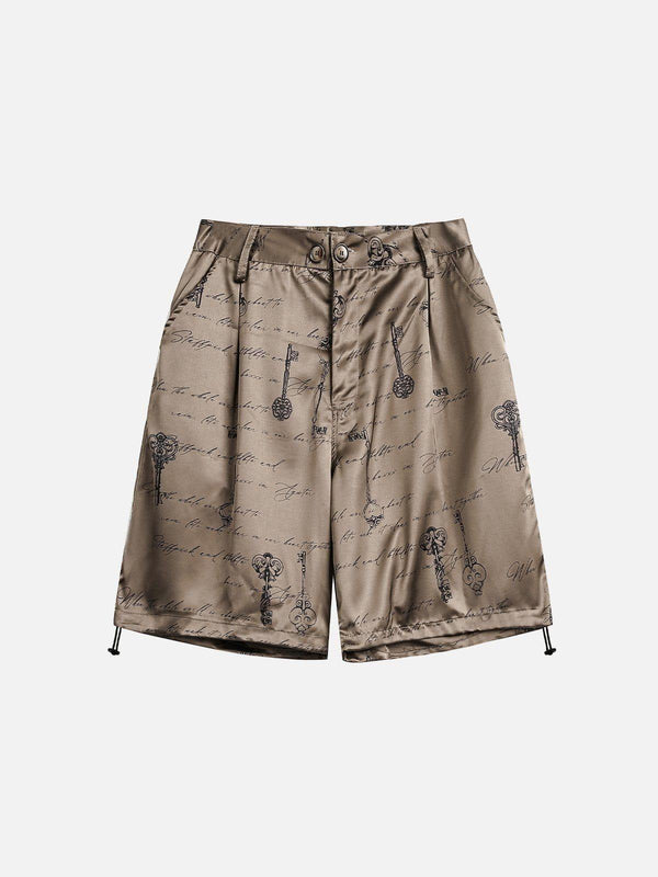 Khaki print silk shorts by TALISHKO, front view showcasing elegant key and script pattern.