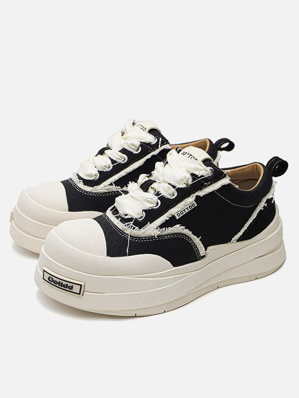 TALISHKO black raggedy round toe sneakers with textured laces, ideal for urban styling.