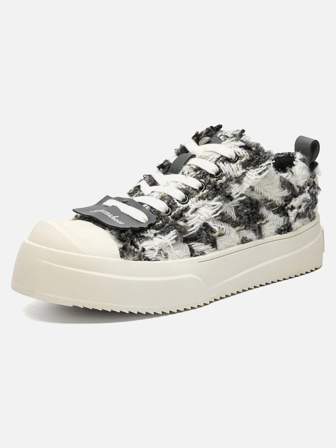 Front view of gray retro canvas sneakers by TALISHKO, featuring textured detailing for a unique look.