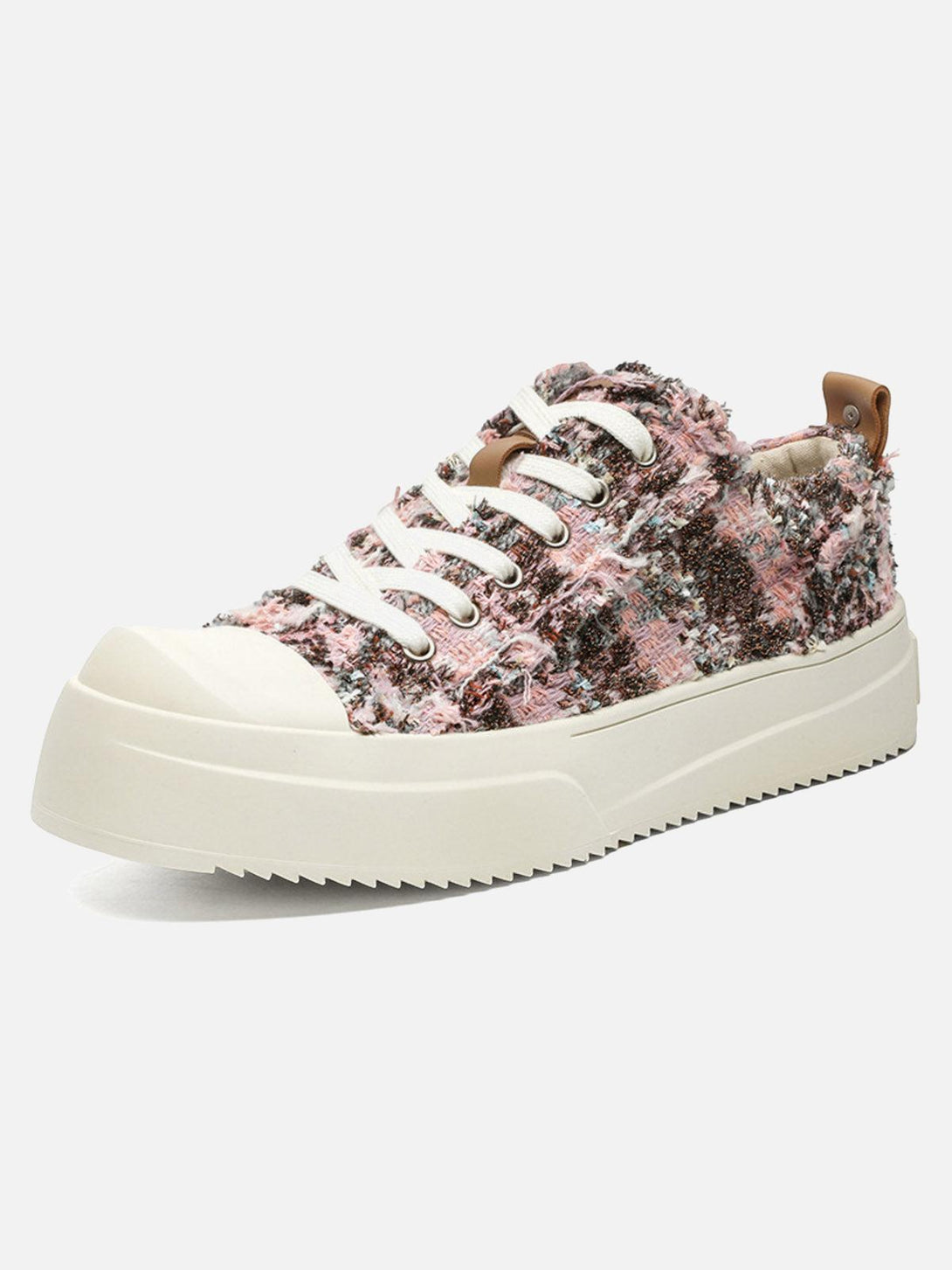 Front view of pink retro canvas sneakers by TALISHKO, showcasing textured detailing.
