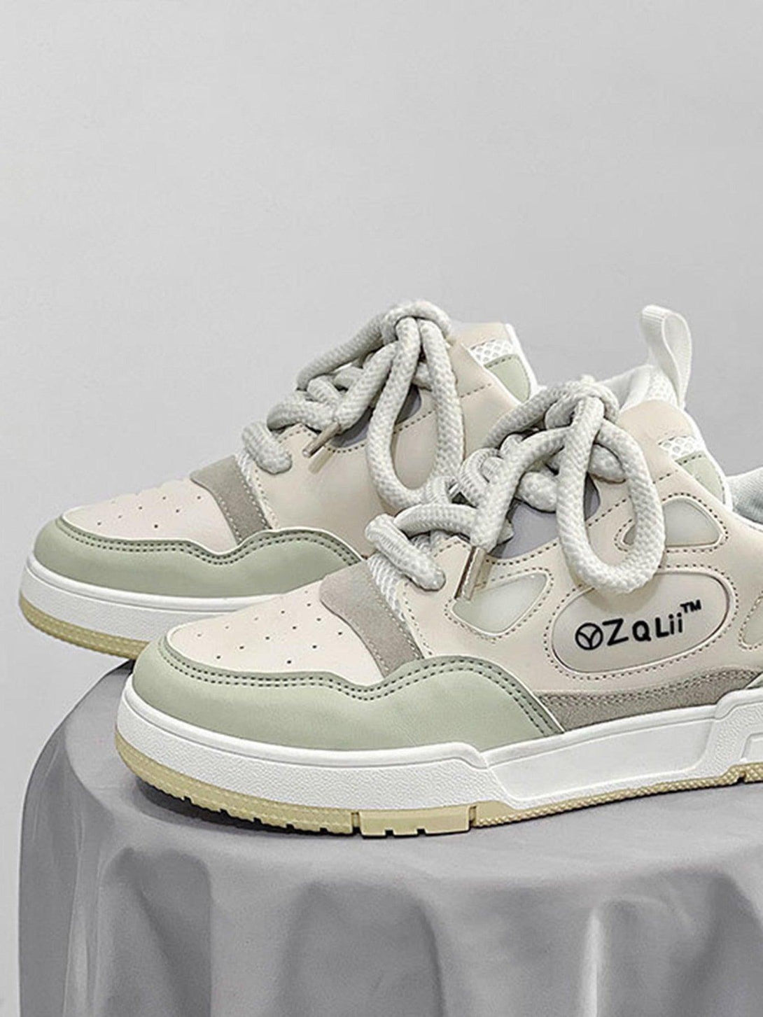 Front view of creamy retro board shoes by TALISHKO, showcasing stylish casual design.