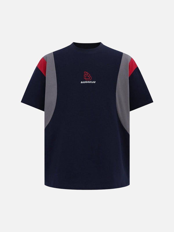 Front view of a TALISHKO blue jersey T-shirt with retro contrast stitching and embroidered letters.