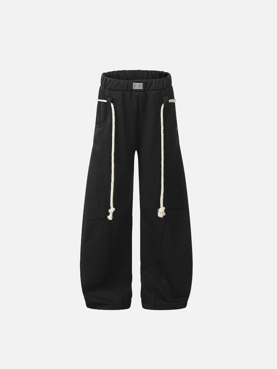 Front view of black retro curved drape sweatpants by TALISHKO with rope drawstrings.