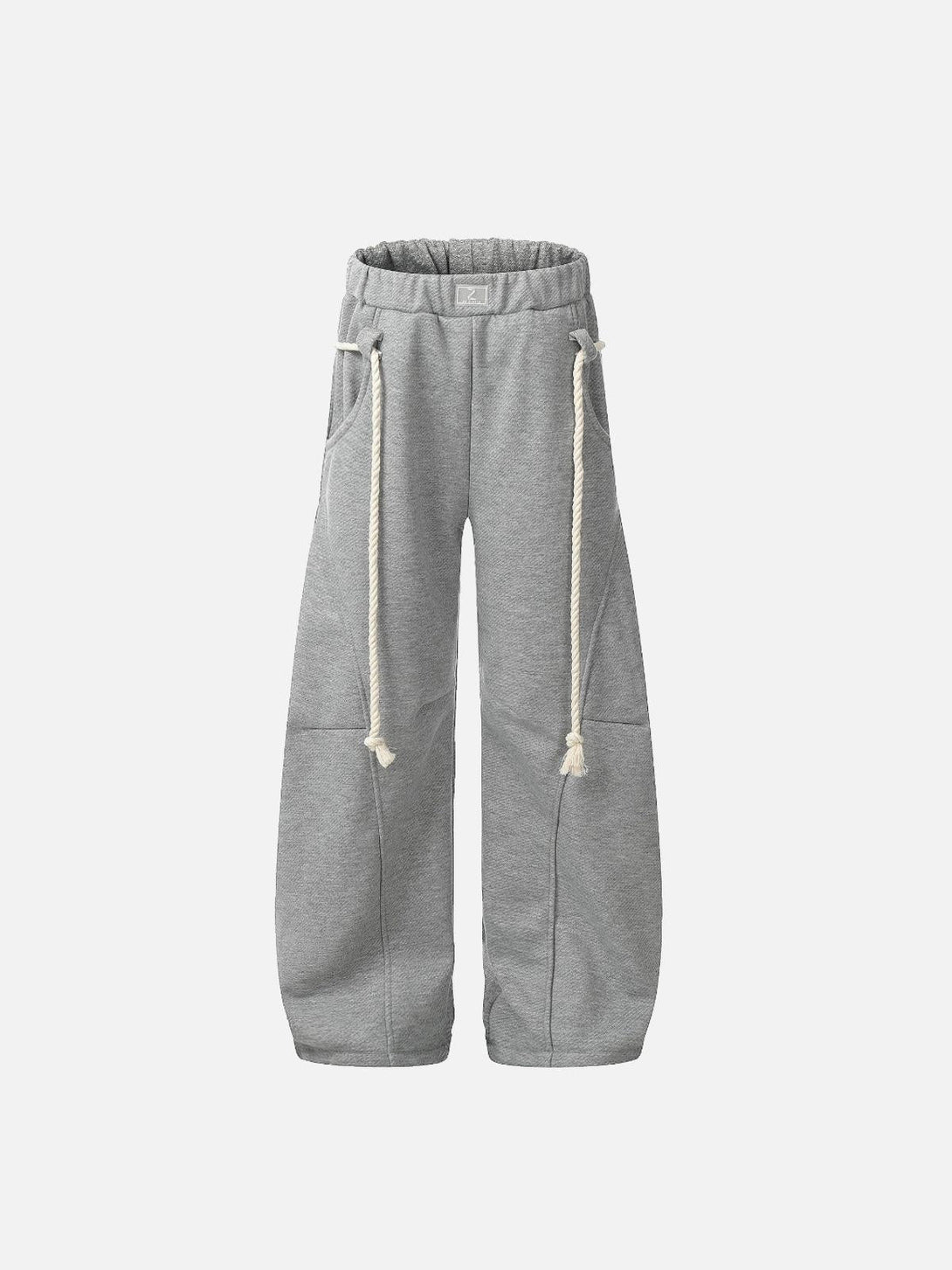 Front view of gray retro curved drape sweatpants by TALISHKO with unique rope drawstrings.