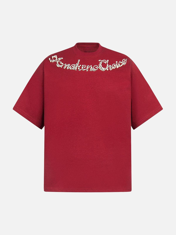 Front view of a red T-shirt by TALISHKO featuring retro embroidery and beaded letter details.