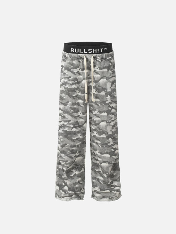 Front view of TALISHKO's camouflage pants with a bold waistband, perfect for urban style.