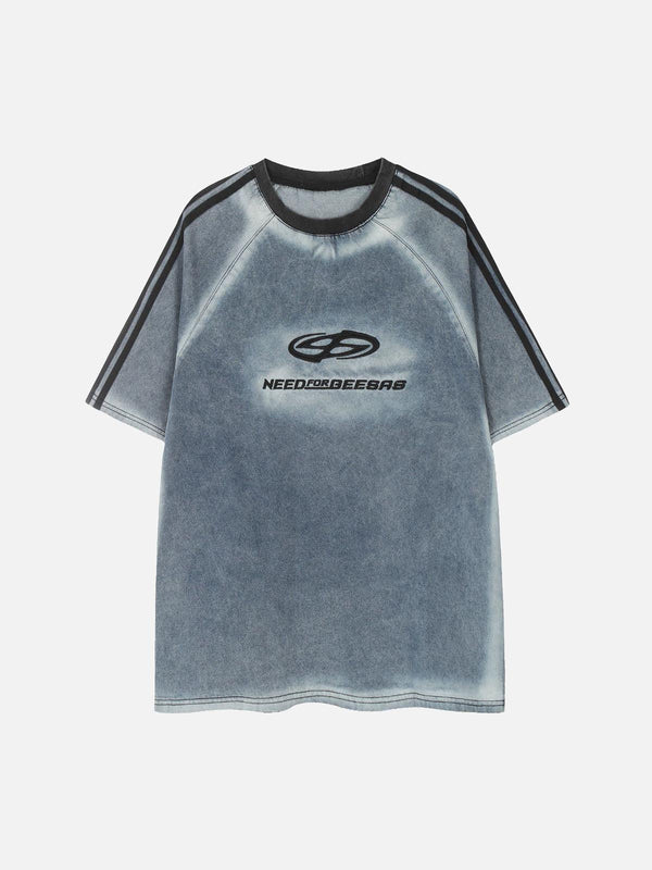 Front view of a blue denim T-shirt with retro embroidery by TALISHKO, perfect for casual style.