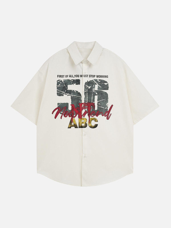 Front view of an apricot short sleeve shirt by TALISHKO with retro letter print design.